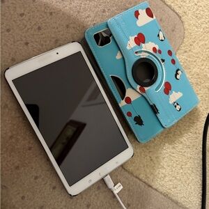 Samsung Tablet with White and Blue Case